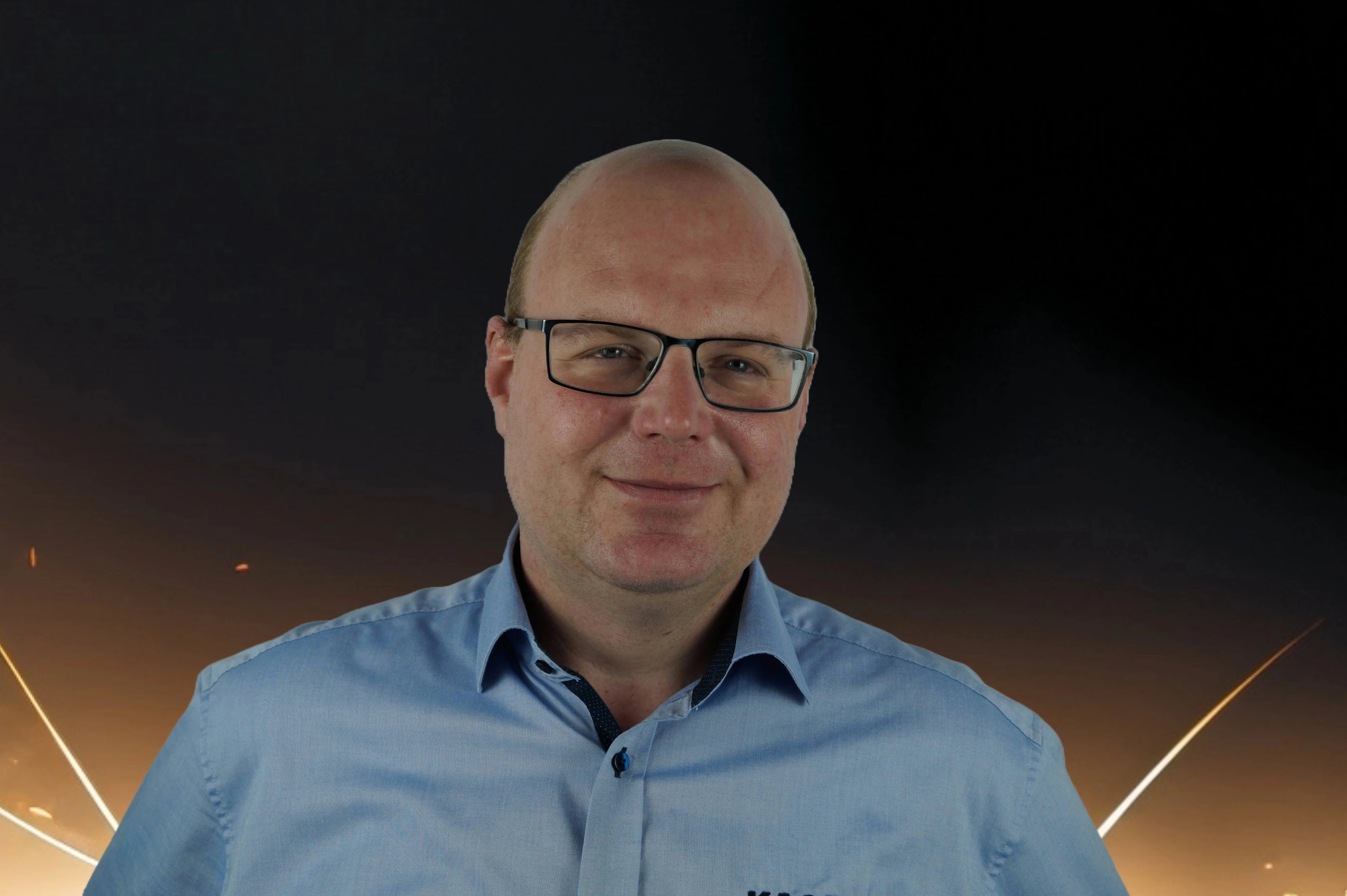Andreas Kaack, lächelnd, in Geschäftskleidung, Geschäftsführer bei der Kaack GmbH.